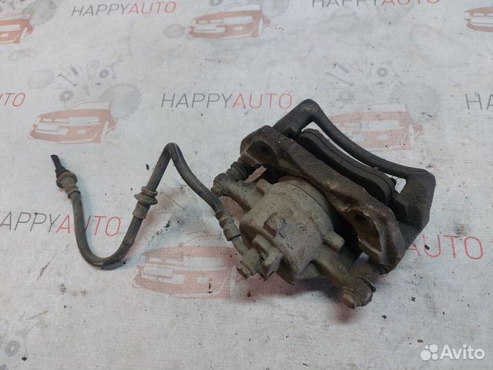 Суппорт передний правый Nissan Primera P11 GA16