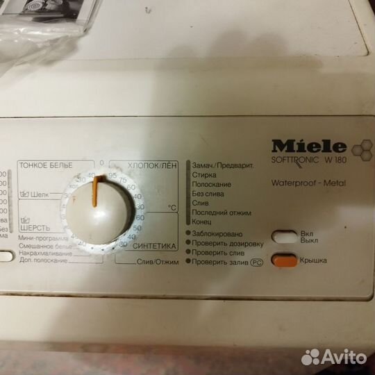 Стиральная машина с вертикальной загрузкой Miele