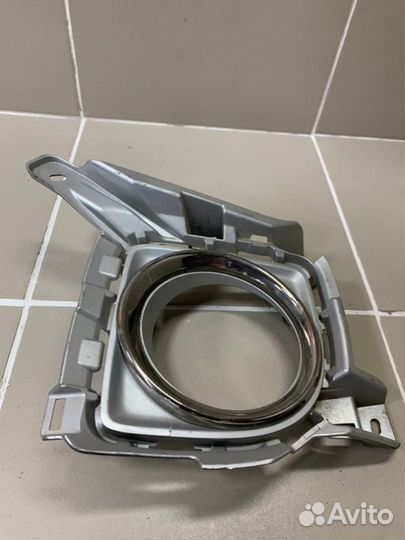 Накладка противотуманной фары передняя левая