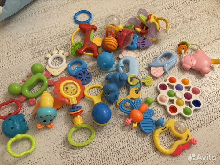 Детские игрушки пакетом и развивающий коврик