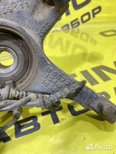 Кулак поворотный передний левый Opel Corsa D 2009