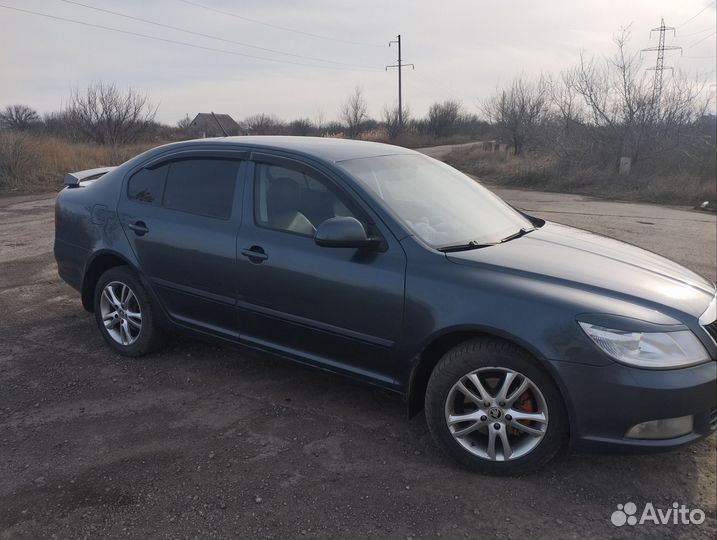 Skoda Octavia 1.8 МТ, 2011, 247 000 км