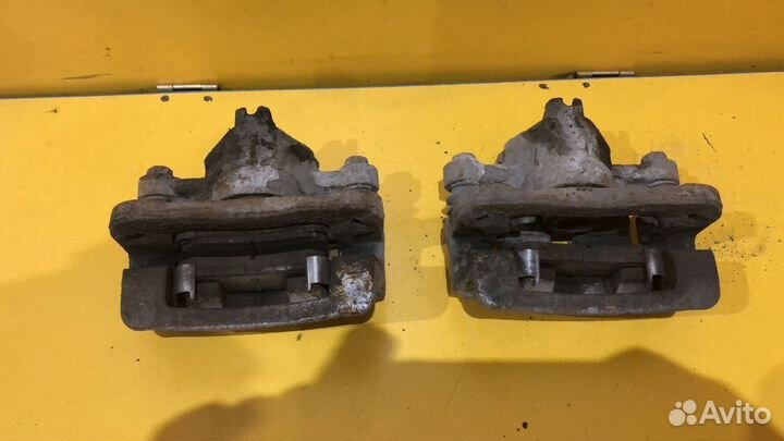 Суппорт тормозной задний Kia Cerato II 2008–2013