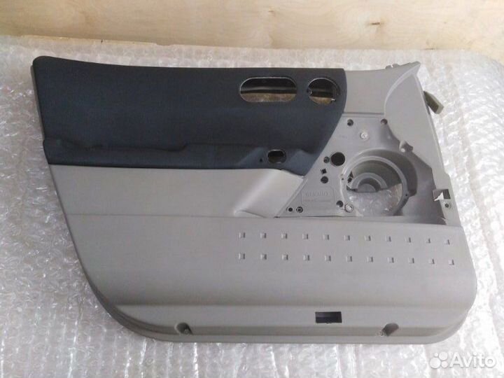 Обшивка двери передняя левая Renault Megane 2002