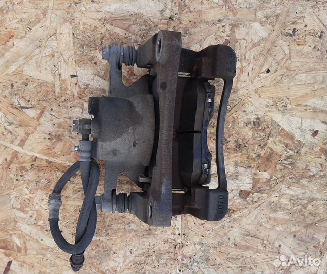 Суппорт тормозной передний правый Mazda CX-5 KE