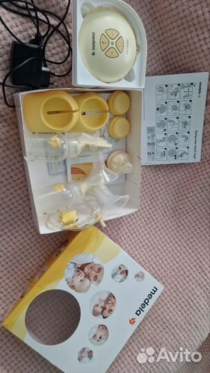 Молокоотсос medela электрический