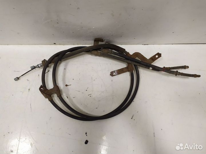 Трос стояночного тормоза Хендай Солярис