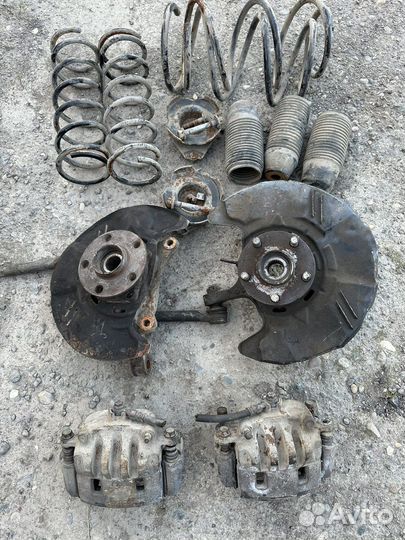 Суппорта передние, ступицы, пружины Subaru impreza