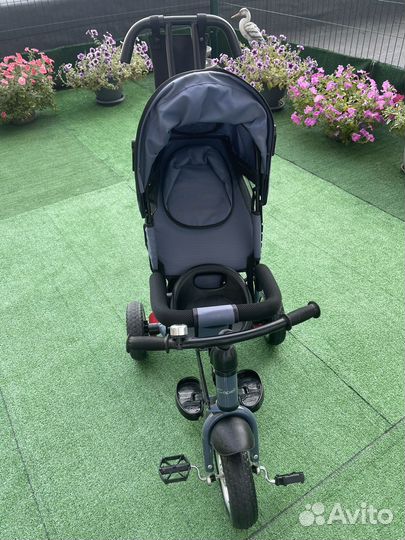 Трехколесный велосипед с ручкой