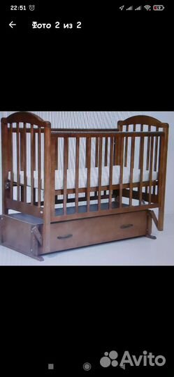 Детская кроватка с маятником и ящиком