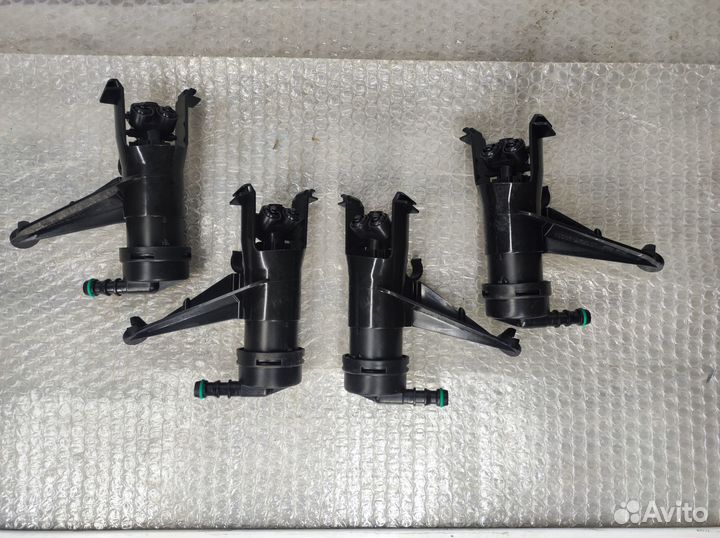 Форсунка омывателя фары Nissan Tiida C11 2007-2013