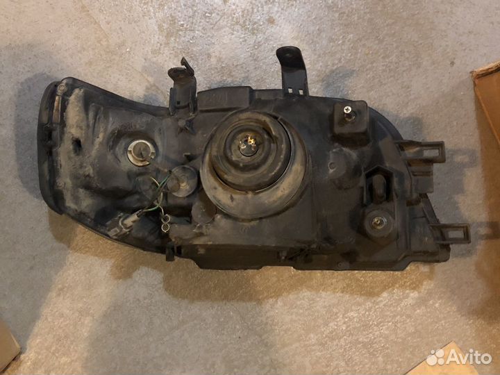 Фара левая Nissan Cube