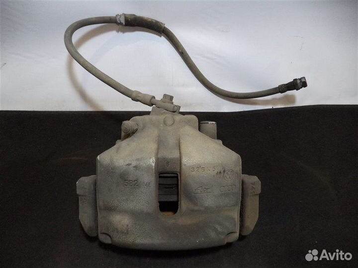 Суппорт передний правый Volkswagen Passat Variant