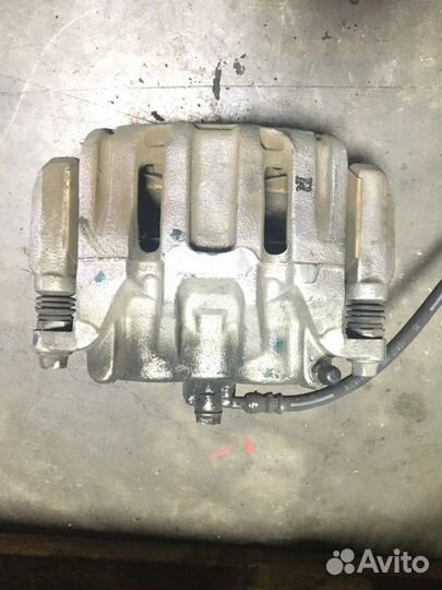 Суппорт тормозной передний правый Honda Crv 5