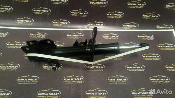 Амортизатор передний левый Nissan Qashqai (J10)