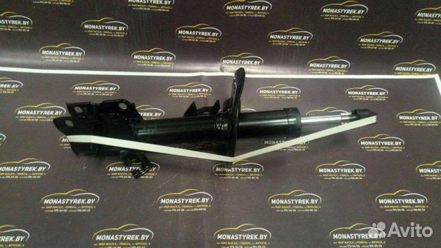 Амортизатор передний левый Nissan Qashqai (J10)