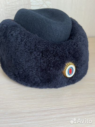 Женская меховая шапка полиция