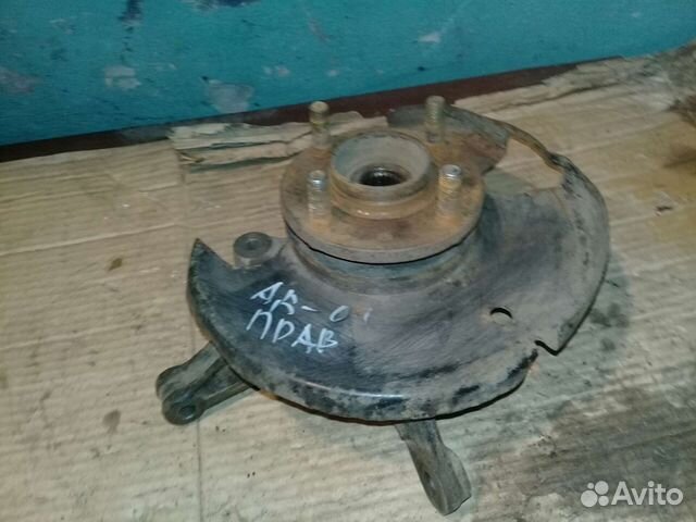 Кулак поворотный правый Nissan AD Y10 1997г