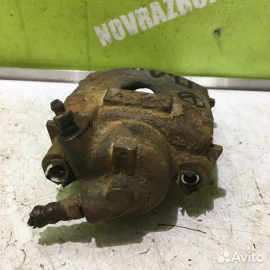 Суппорт передний левый Фольксваген Гольф 2 Джетт