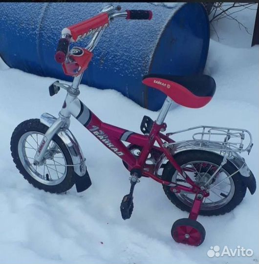 Детский велосипед с поддерживающими колëсами