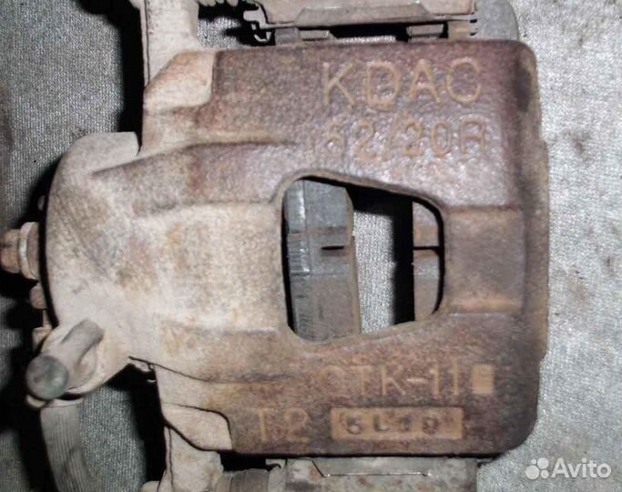 Суппорт передний левый Chevrolet Aveo T200