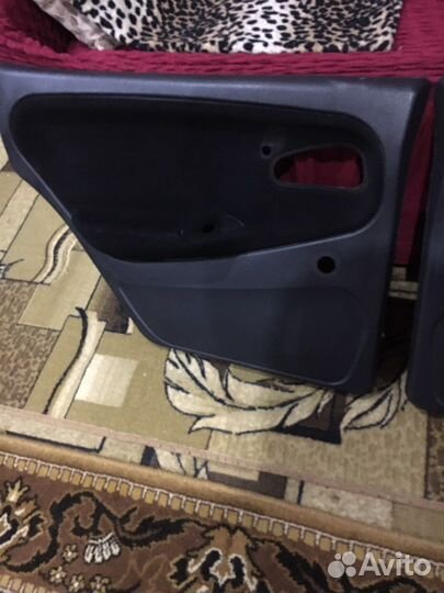 Обшивки задних дверей на ваз2114