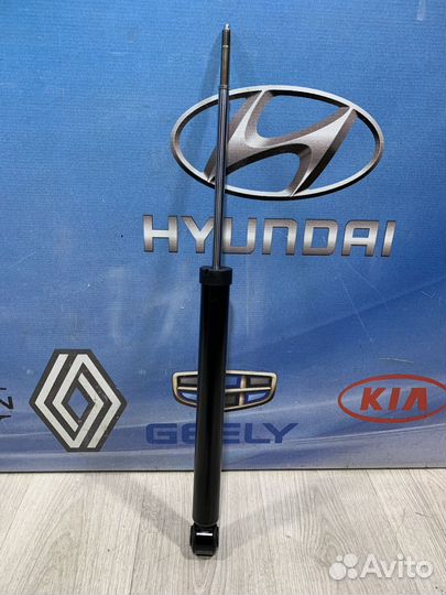 Амортизатор стойка зад Geely MK cross