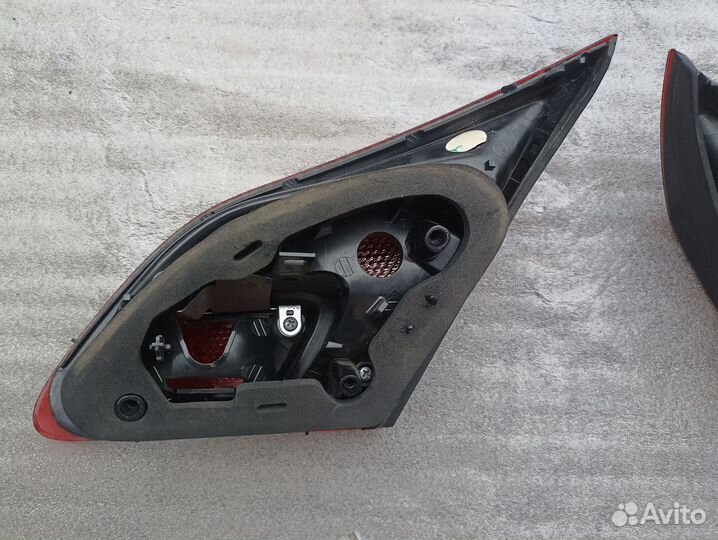 Фонарь в крышку багажника Opel Astra J 2009-2016