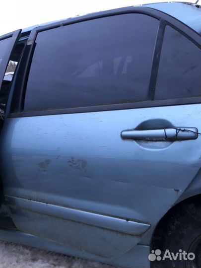 Дверь задняя левая на Mitsubishi Lahcer 9