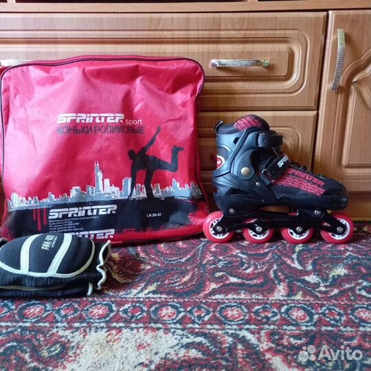 Роликовые коньки