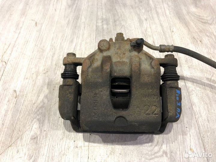 Суппорт тормозной передний левый Kia Rio 3 G4FA