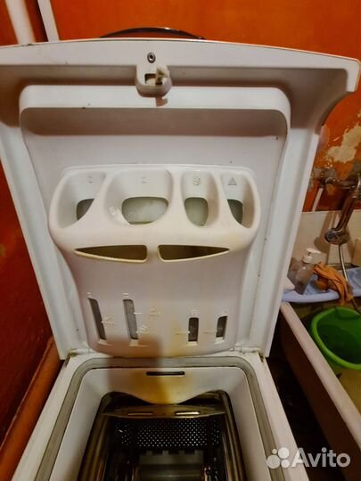 Стиральная машина с вертикальной загрузкой