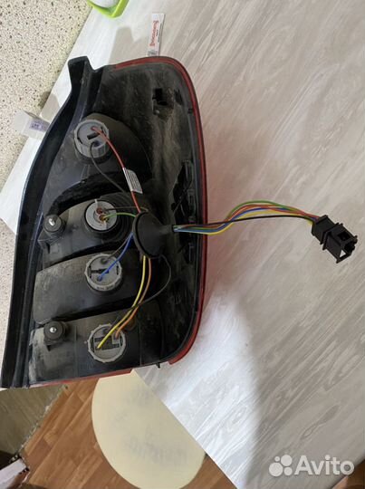 Задний левый фанарь гранта fl универсал