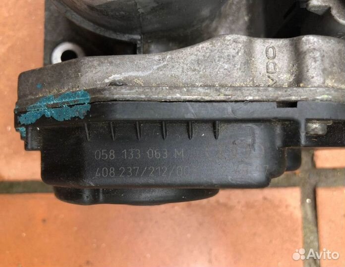 Заслонка дроссельная VW Passat B5 058133063M