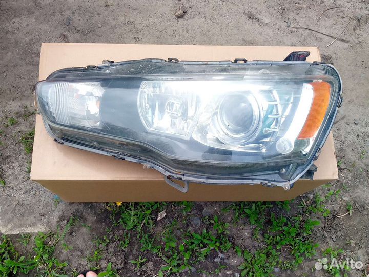 Фара передняя левая mitsubishi lancer 10