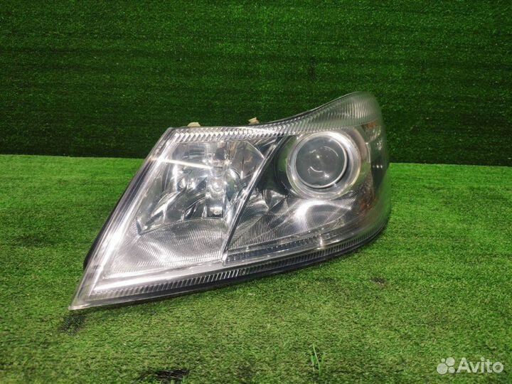 Фара передняя левая оригинал Skoda Octavia A5