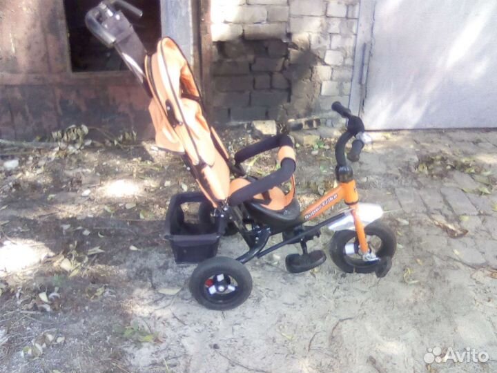 Детский трехколесный велосипед коляска