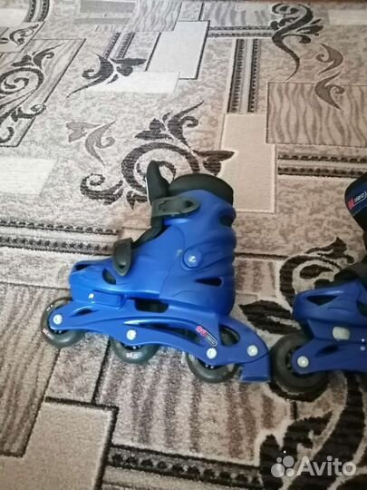 Роликовые коньки