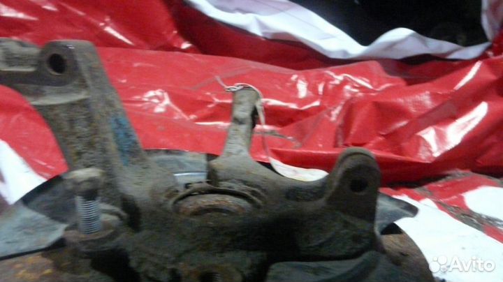 Кулак Renault Logan передний правый I (2004—2009)