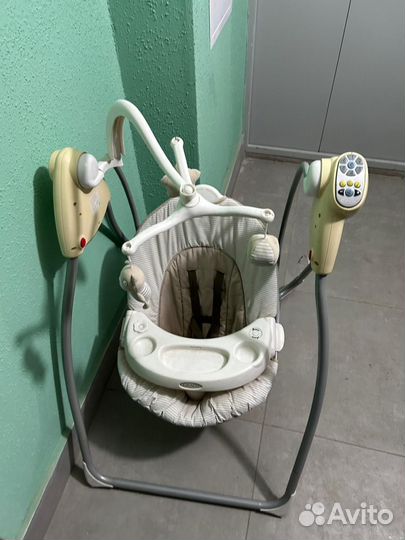 Электронные качели для новорожденных