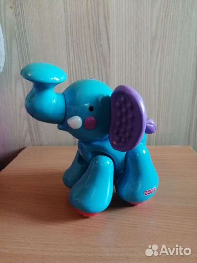 Развивающая игрушка fisher price слоник