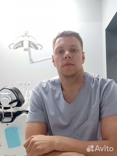 Врач стоматолог