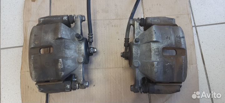 Суппорт тормозной передний nissan X-Trail Qashqai