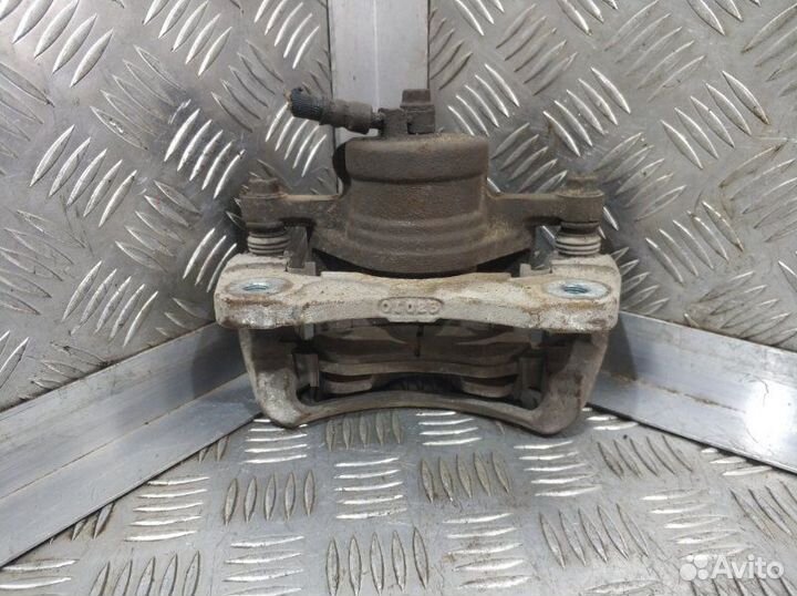 Суппорт передний левый Chevrolet Lacetti J200