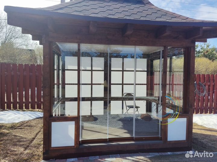 Безрамное раздвижное остекление веранд