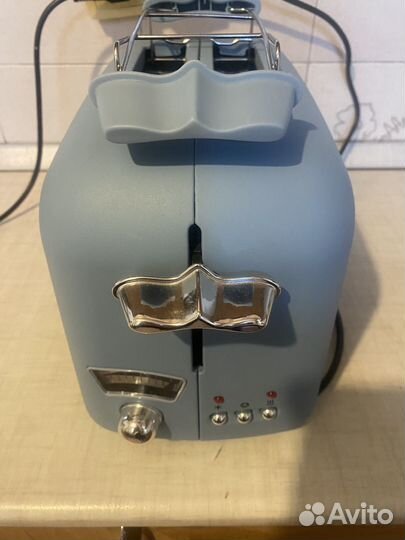 Тостер Delonghi