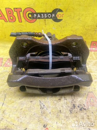 Суппорт передний левый Nissan Primera W11 SR20DE