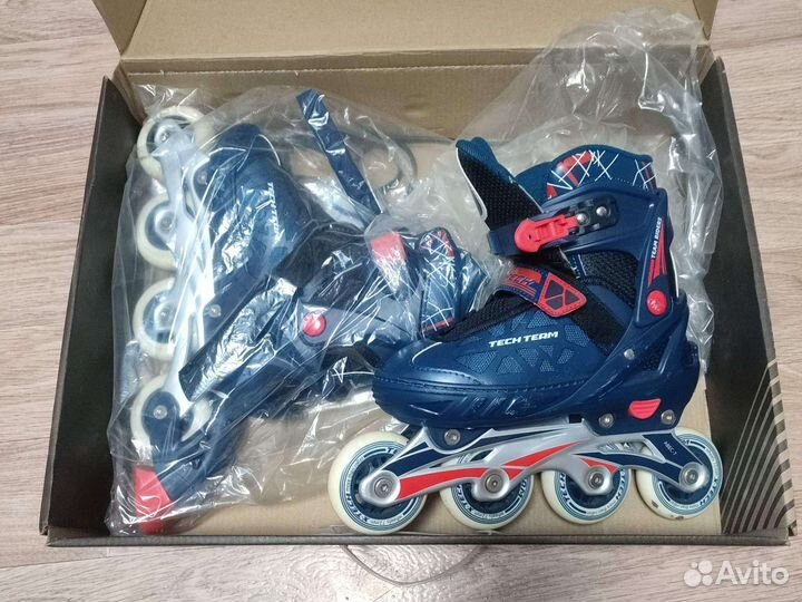 Роликовые коньки