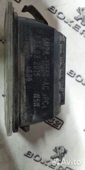 Фонарь подсветки номера Ford