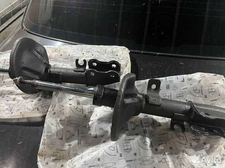 Стойки передние Kia Spectra